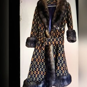 Women's warm winter Fur trimmed coat.